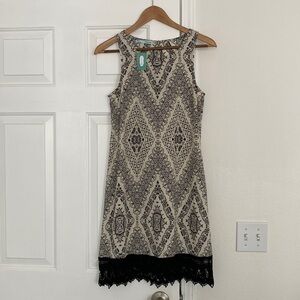 NWT Maurice’s black and cream sleeveless shift dress.